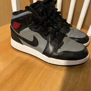 Nike Black and Gray Sneakers with Classic Design